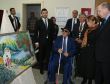 Erdoğan, görme engelli ressam Armağanın sergisini gezdi