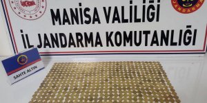 Manisa'da sahte sikkelerle dolandırıcılık şüphesiyle 2 gözaltı