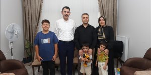 Kurum, Adıyaman'da yeni evlerine kavuşan depremzede aileye misafir oldu
