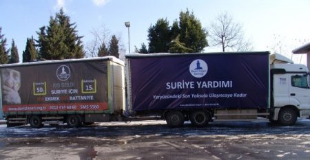 Deniz Feneri’nden Suriyeli mültecilere kışlık elbise yardımı