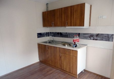 Engelli çocuk ve annesi yeni eve kavuştu