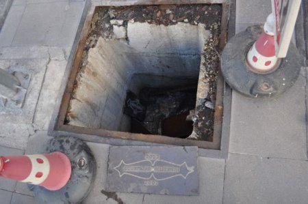 Eskişehir'de sokaktaki rögar kapağına basan vatandaş 2 metrelik çukura düştü