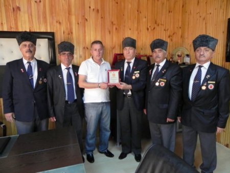 Gaziler Derneği yönetimi, Çilek Halk Otobüsçüleri Kooperatifi'ni ziyaret etti