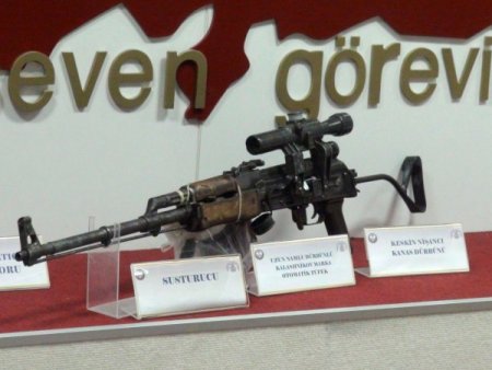 Gitar kutusundan dürbünlü tüfek çıktı