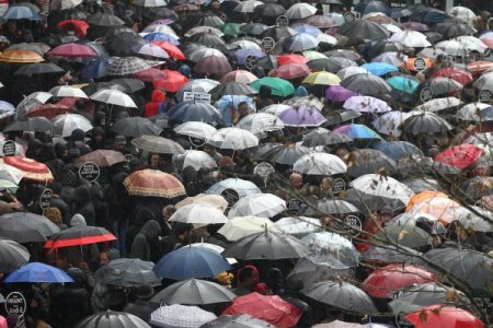 Hrant Dink'i yağmur altında andılar