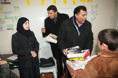 İHH Suriyeli yetimlere yardım eli uzattı