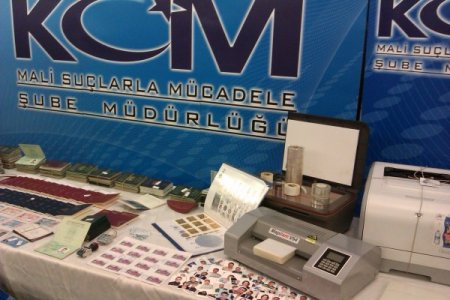 Kaçaklara sahte pasaport düzenleyen şebeke çökertildi