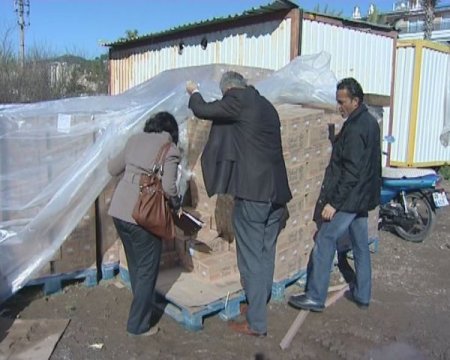 Marmaris'te 57 bin kutu okul sütü boş arazide bulundu