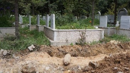 Mezardan top mermisi çıktı