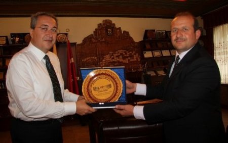 NEVDER’den Başkan Ünver'e teşekkür plaketi