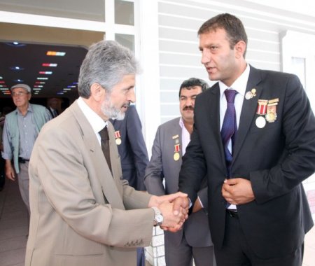 Sincan protokolü, şehit yakınları ve gazilerle bir araya geldi