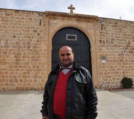 Suriye’den gelen 110 Süryani vatandaş Midyat’a yerleşti