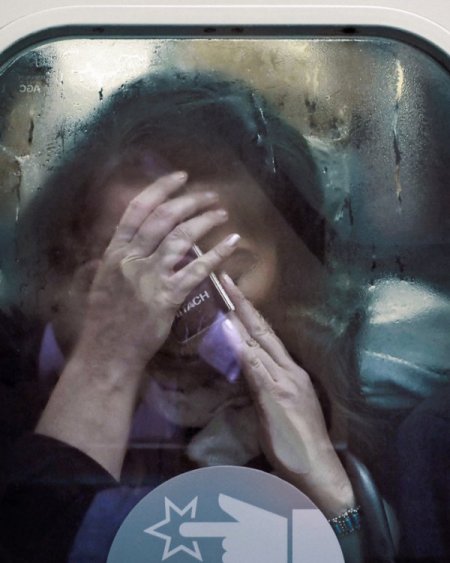 Tokyo metrosundaki yoğunluk fotoğraflara yansıdı