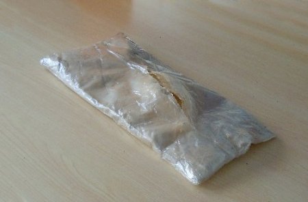 Zehir taciri kadın, kuşağında uyuşturucu taşırken yakalandı